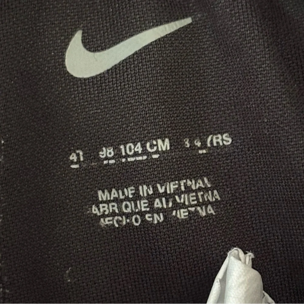 Nike Black and Gray Boys Athletic Shorts with White Swoosh